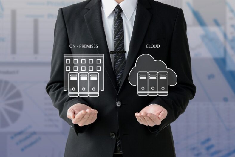 Businessman comparing on-premises and cloud